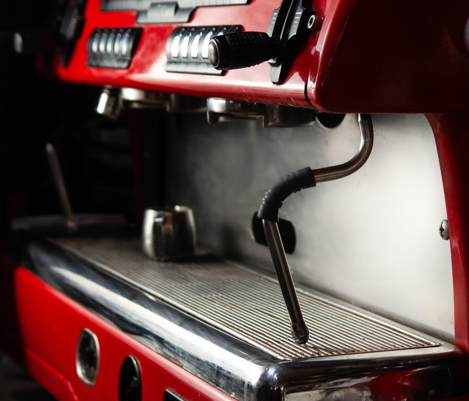 Close-up of a commercial espresso machine in a cafe.